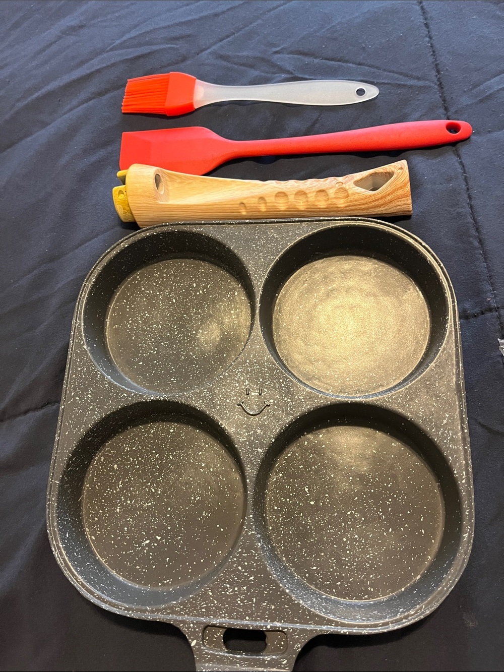 Mini pancake and egg pan comes with the handle a mini brush and a spatula